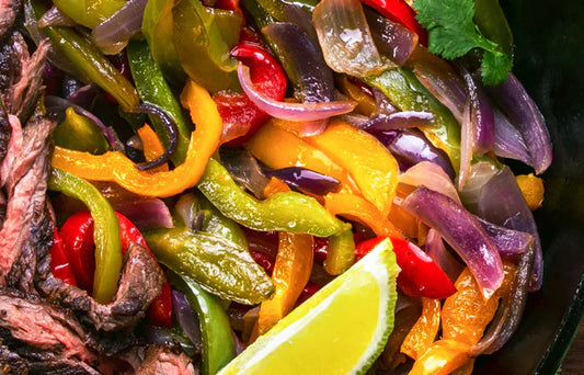 Skirt Steak with Red Peppers and Onions